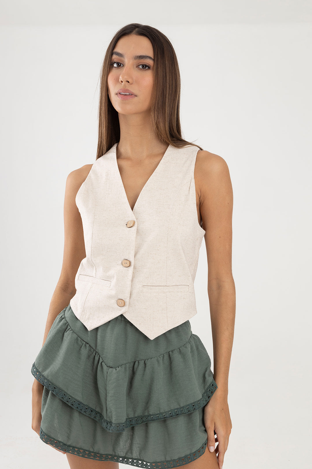 Falda verde con pretina elástica y boleros Greca
