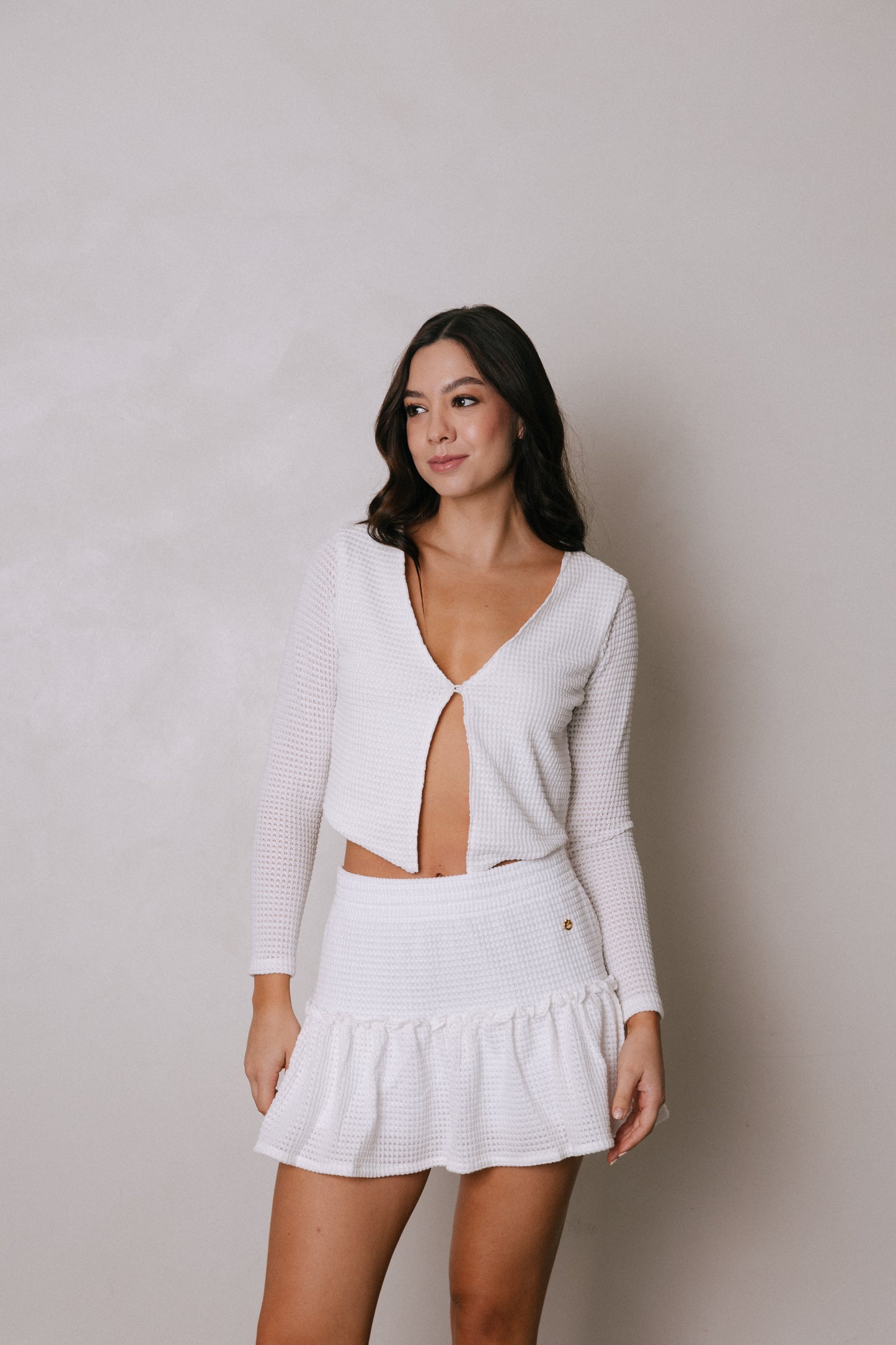 Falda marfil en tela tejida con pretina elástica Lula