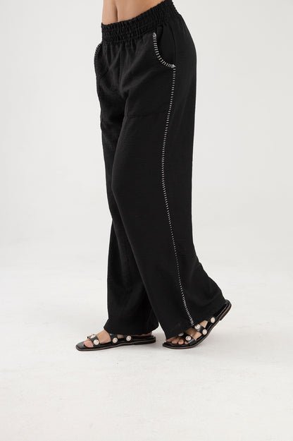 Pantalón negro, silueta recta con pretina elástica Marea