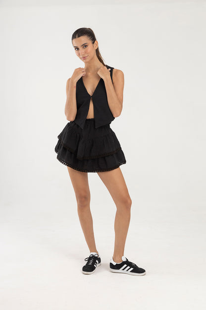 Falda negra con pretina elástica y boleros Greca