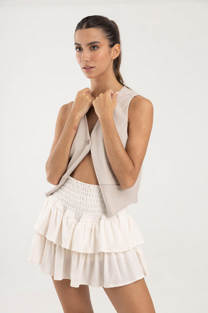 Falda blanca con boleros en tela polyester y pretina elástica Salar