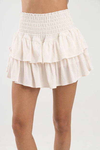Falda blanca con boleros en tela polyester y pretina elástica Salar