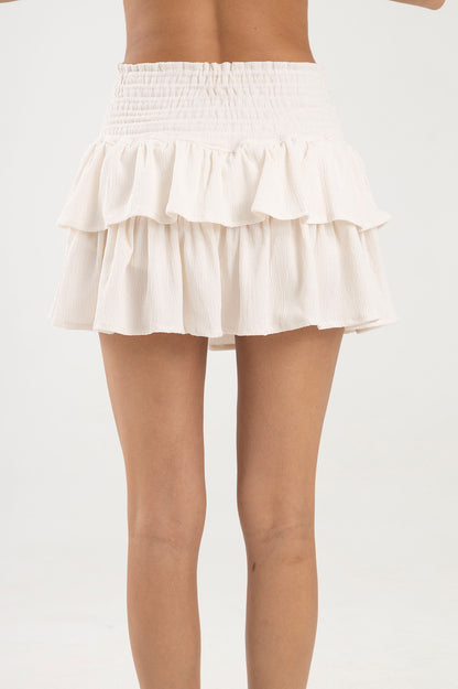 Falda blanca con boleros en tela polyester y pretina elástica Salar