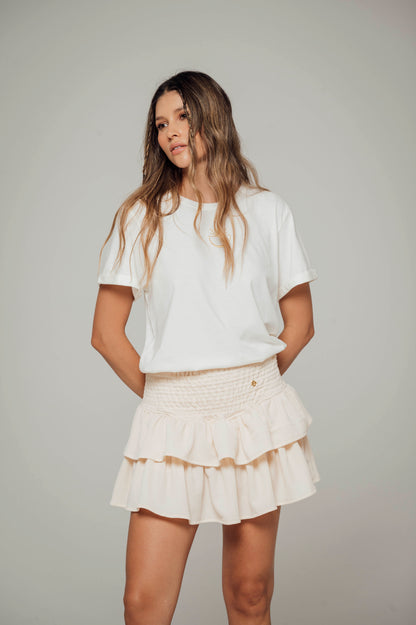 Falda crema con boleros en tela polyester y pretina elástica Salar