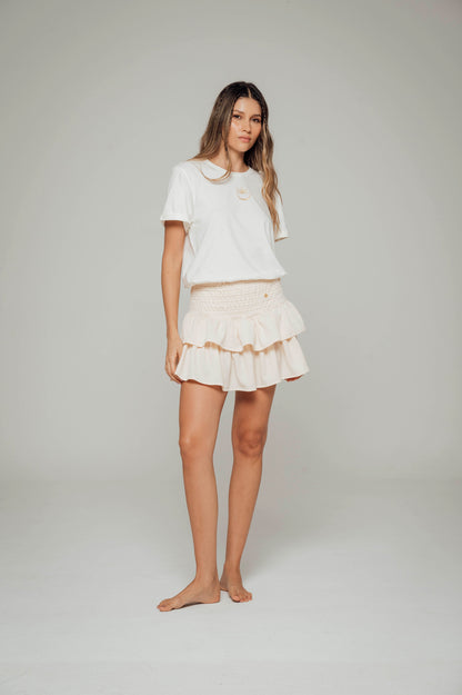 Falda crema con boleros en tela polyester y pretina elástica Salar